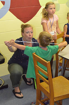 Erin Measures Child's Arm Span of Child