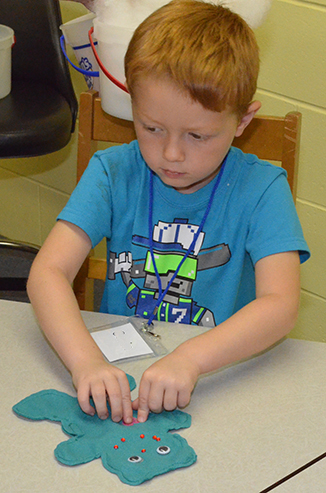 Children Working on His Craft