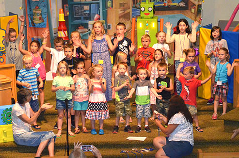 Children Singing for Their Parents