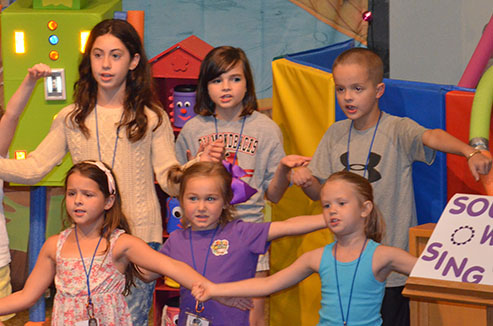 Children Singing for Their Parents