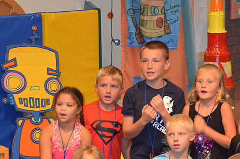 Children Singing for Their Parents