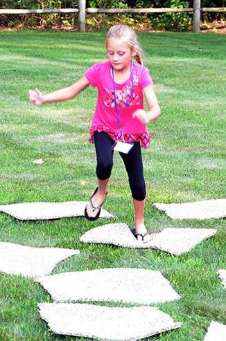 Child Playing 'Hop-Scotch'