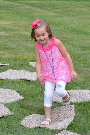 Child Playing 'Hop-Scotch'