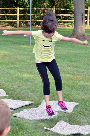 Child Playing 'Hop-Scotch'