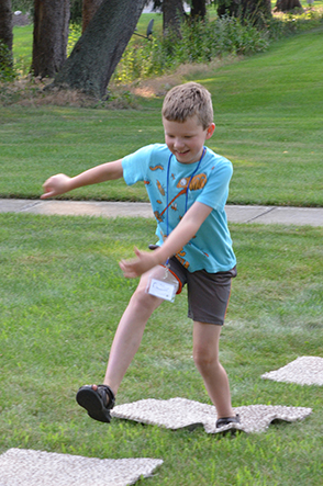 Child Playing 'Hop-Scotch'