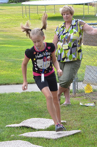 Child Playing 'Hop-Scotch'