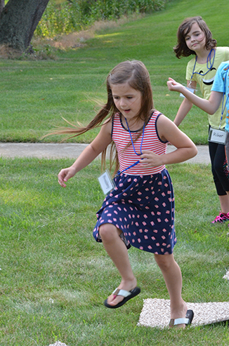 Child Playing 'Hop-Scotch'