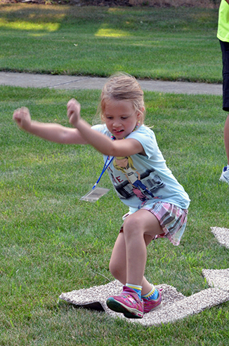 Child Playing 'Hop-Scotch'