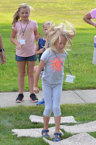 Child Playing 'Hop-Scotch'