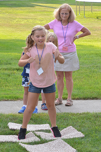 Child Playing 'Hop-Scotch'