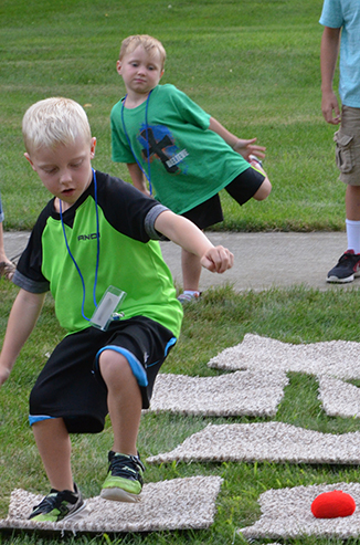 Child Playing 'Hop-Scotch'