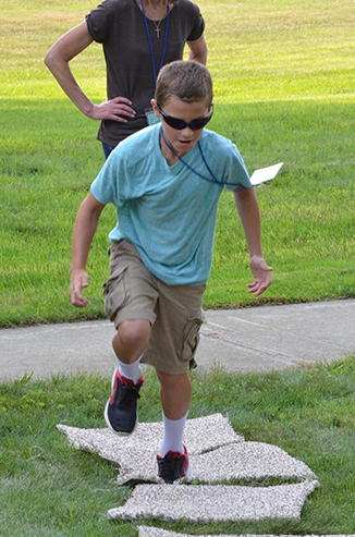 Child Playing 'Hop-Scotch'