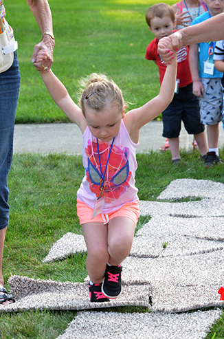 Child Playing 'Hop-Scotch'