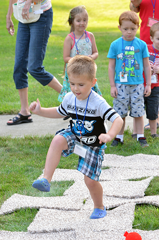 Child Playing 'Hop-Scotch'