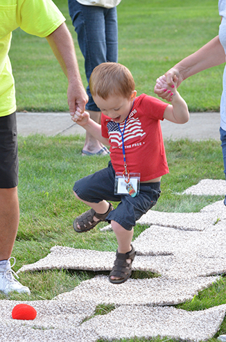 Child Playing 'Hop-Scotch'