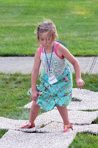 Child Playing 'Hop-Scotch'