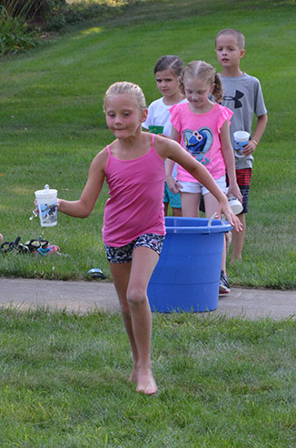 Child Running with Glass of Water