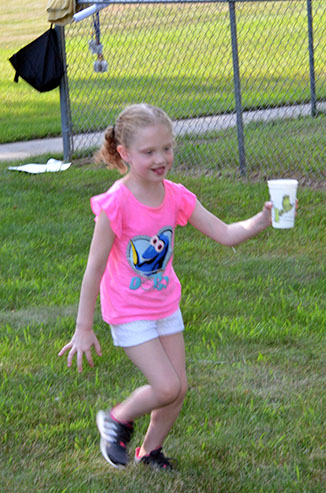 Child Running with Glass of Water