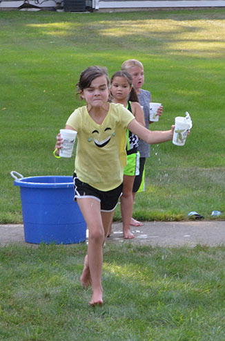 Child Running with Glass of Water