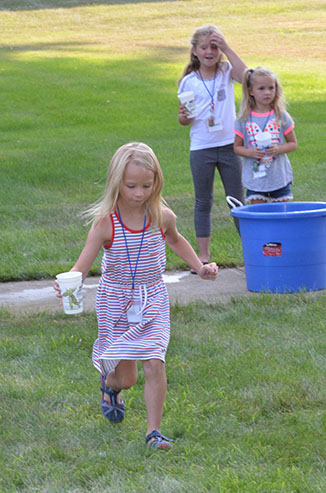 Child Running with Glass of Water