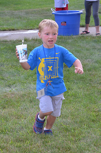 Child Dumping Glass of Water