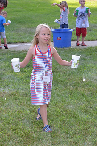 Child Running with Glass of Water