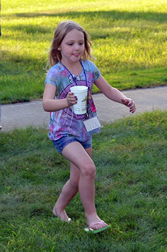 Child Running with Glass of Water