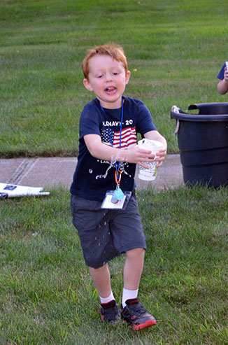 Child Running with Glass of Water