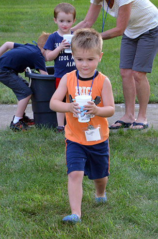 Child Running with Glass of Water