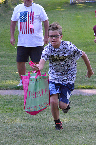 Child Running with Bag