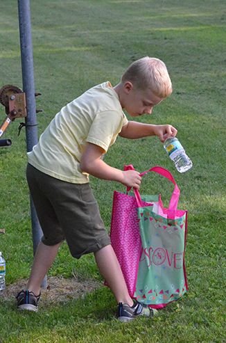 Child Running with Bag