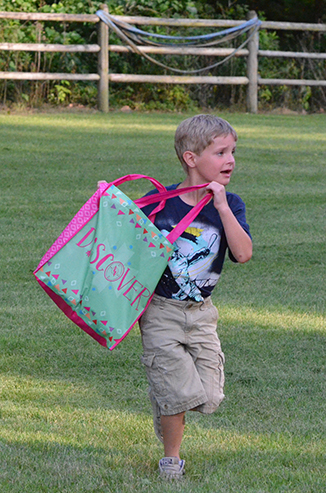 Child Running with Bag