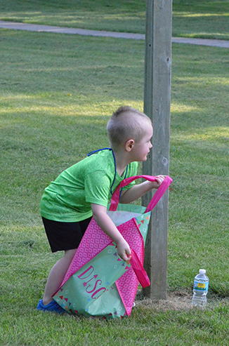 Child Running with Bag