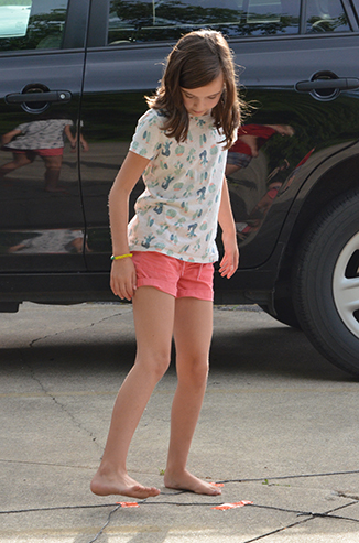 Child Walking a Line Path