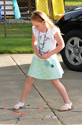 Child Walking a Line Path