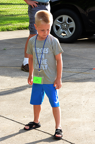 Child Walking a Line Path