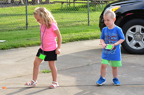 Child Walking a Line Path