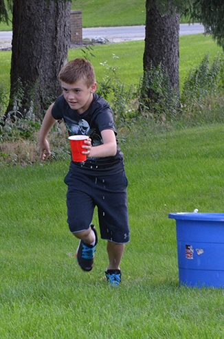 Child Running with Water