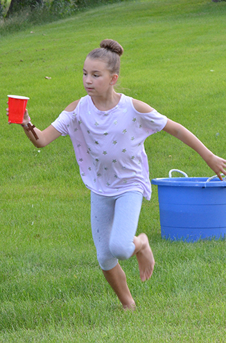 Child Running with Water