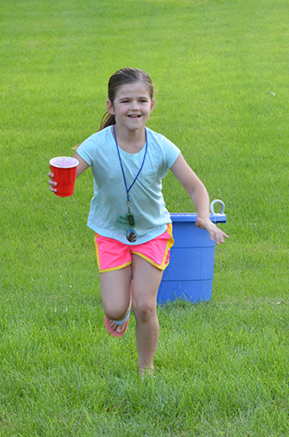 Child Running with Water