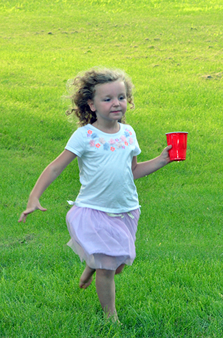 Child Running with Water