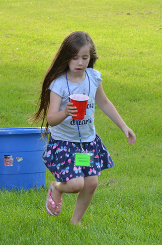 Child Running with Water