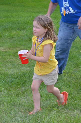 Child Running with Water