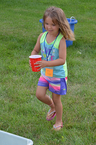 Child Running with Water