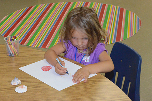 Child Learning About Friction