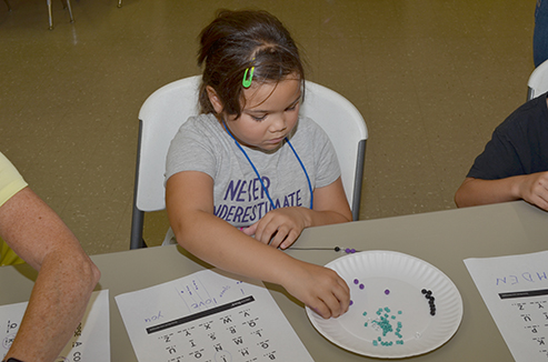 Child Working on Craft