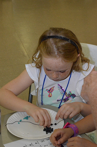 Child Working on Craft