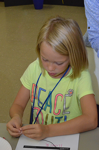 Child Working on Craft