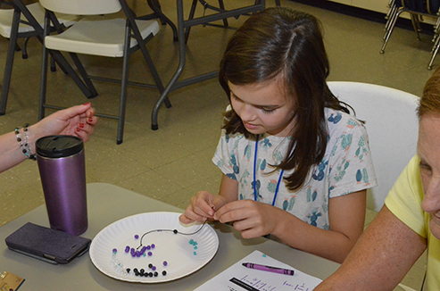 Child Working on Craft