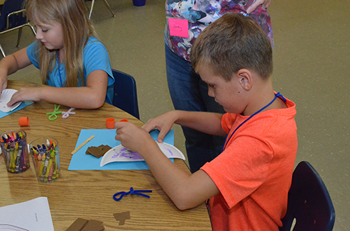 Child Working on Craft